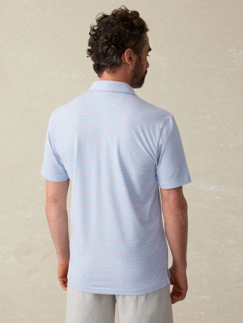 Movement Stripe Polo Vista View